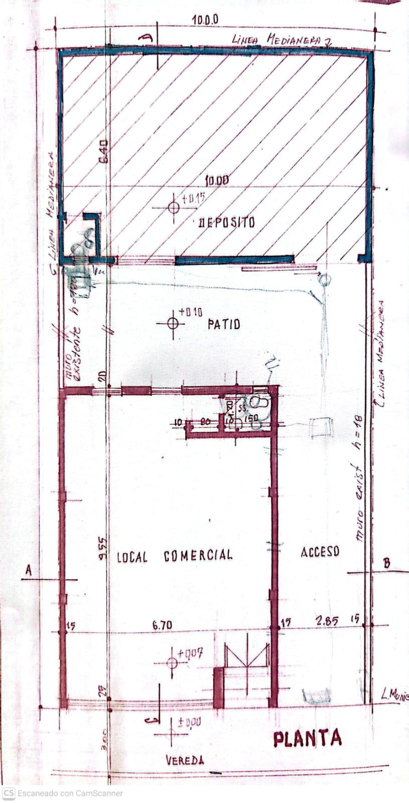 Lote en zona comercial con local